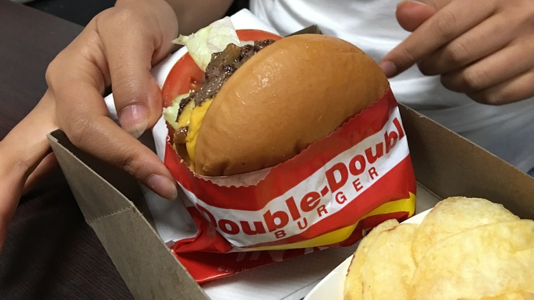 Burger in red and white wrapper