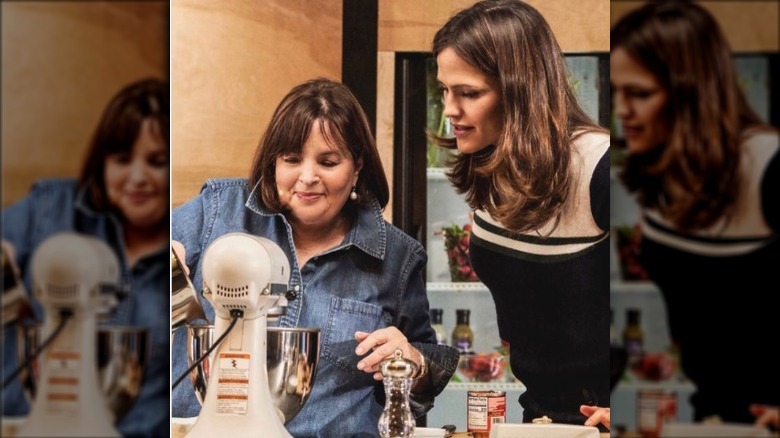 Ina Garten wearing a denim button down with Jennifer Garner