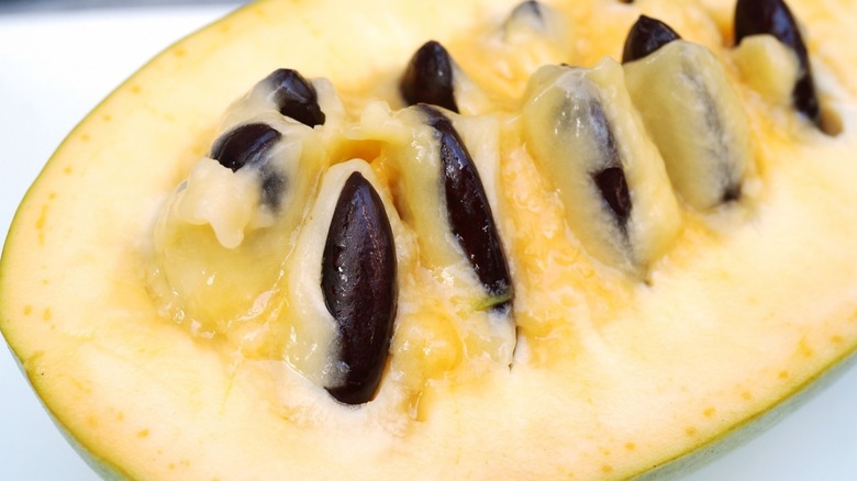 A cut open ripe pawpaw