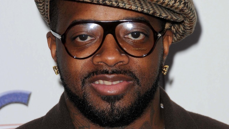 Jermaine Dupri in hat and glasses