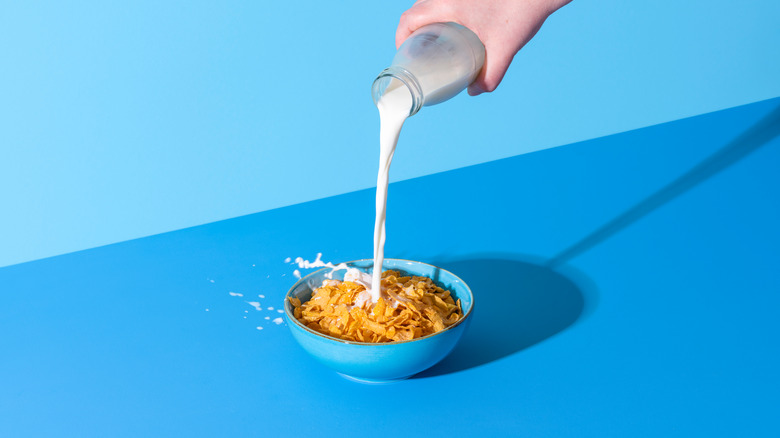 Pouring milk into cereal