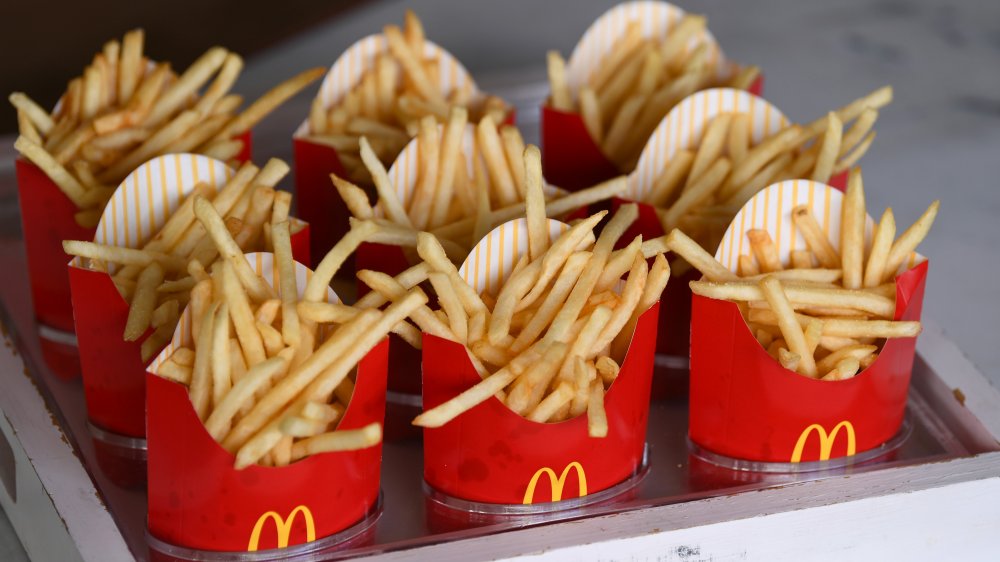 Many boxes of McDonald's French Fries