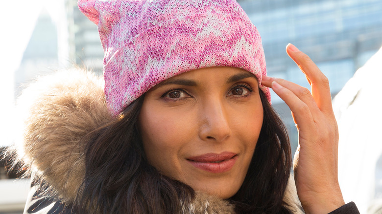 Padma Lakshmi wearing pink hat