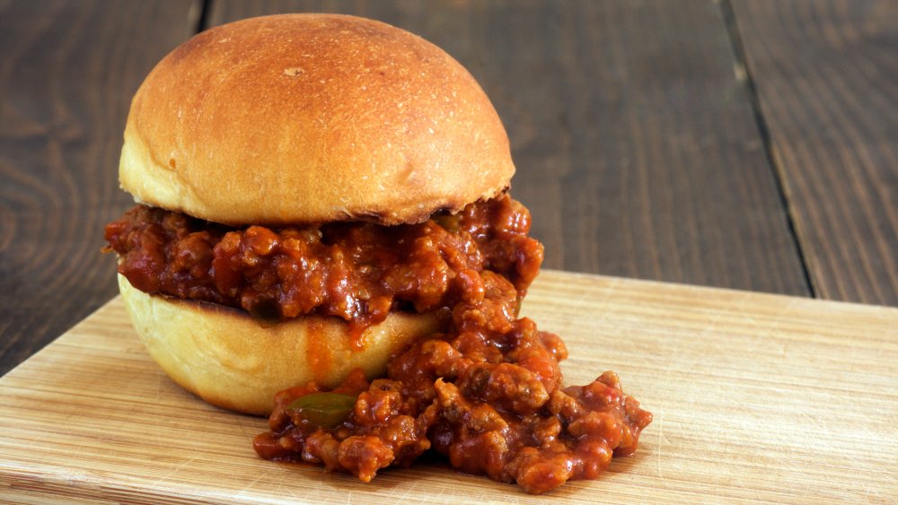 Sloppy joe sandwich on a wooden board