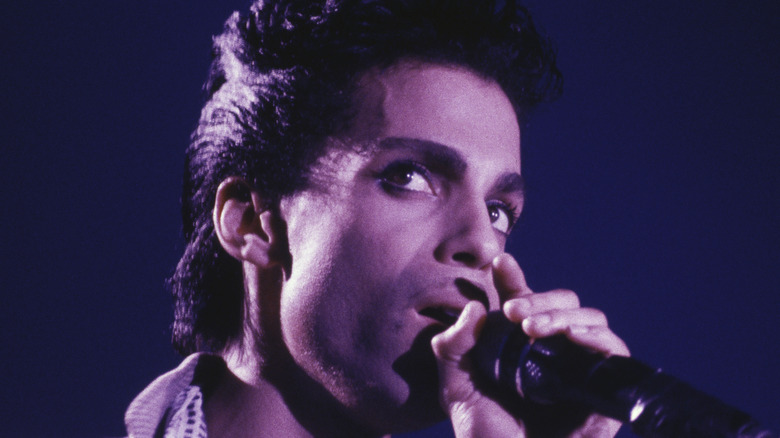 Prince singing in microphone