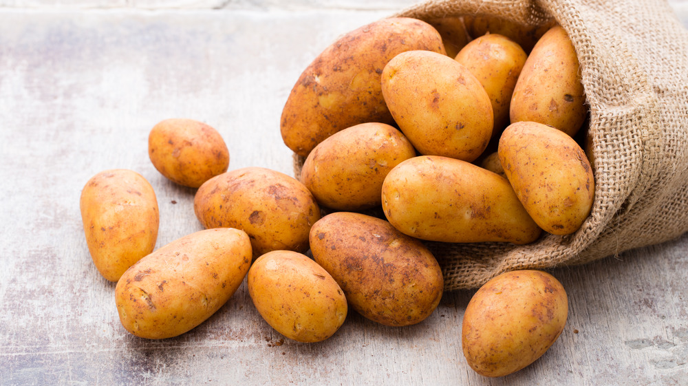 Burlap bag of russet potatoes 