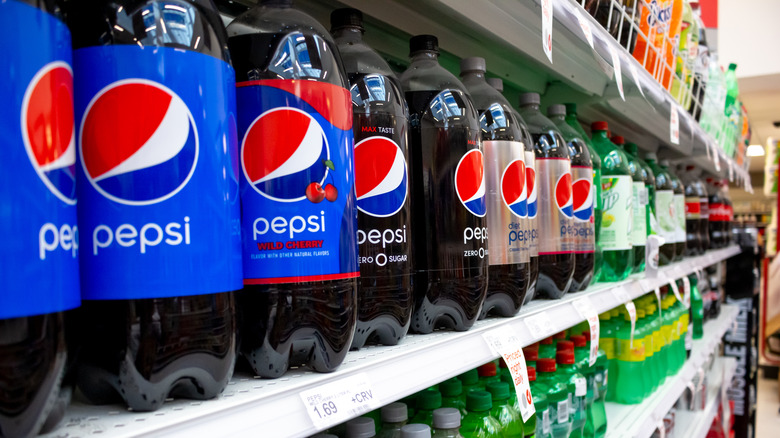 Soda bottles on store shelves