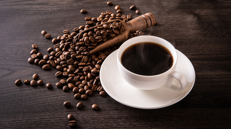 Hot coffee with coffee beans