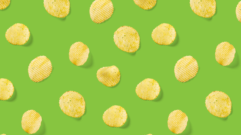 A close-up of a bunch of potato chips