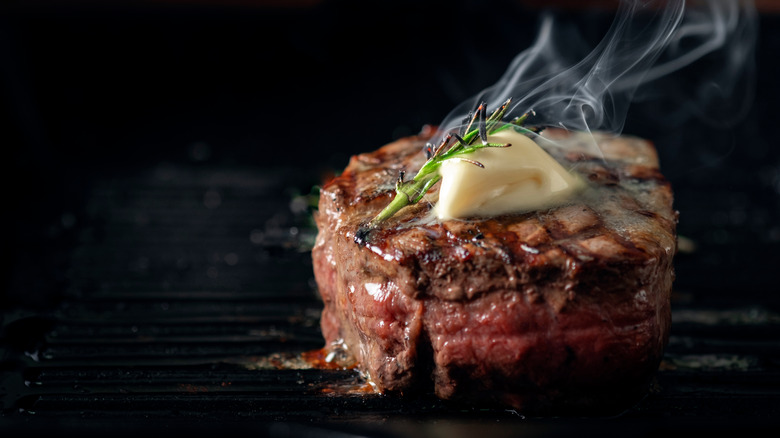Grilled steak with butter