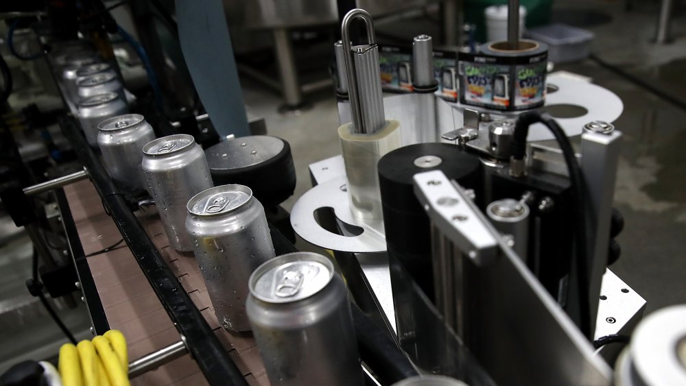 aluminum cans on an assembly line