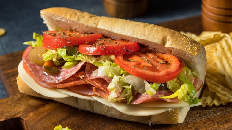 Italian sandwich with meat, cheese, lettuce, tomato