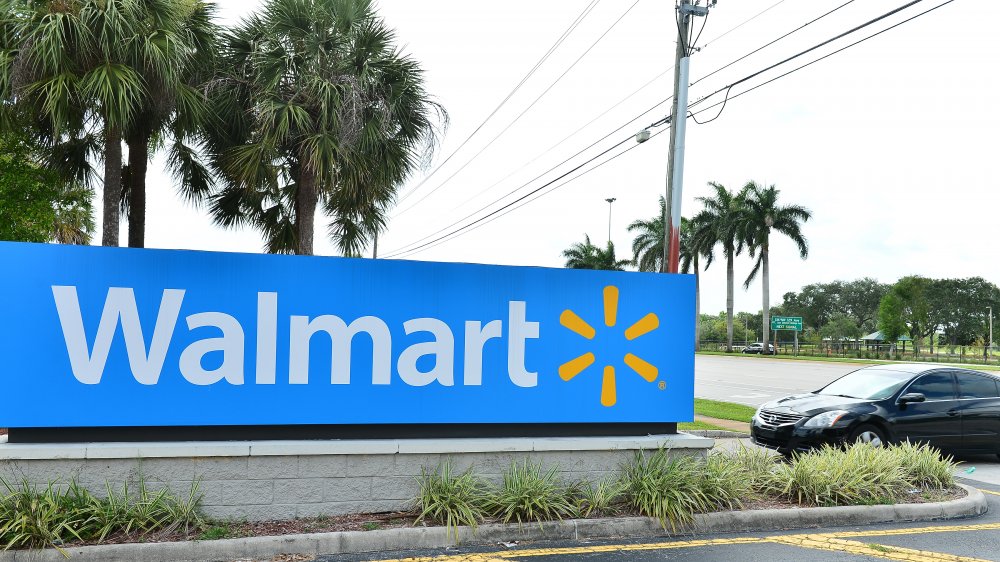 A wall of Walmart logo