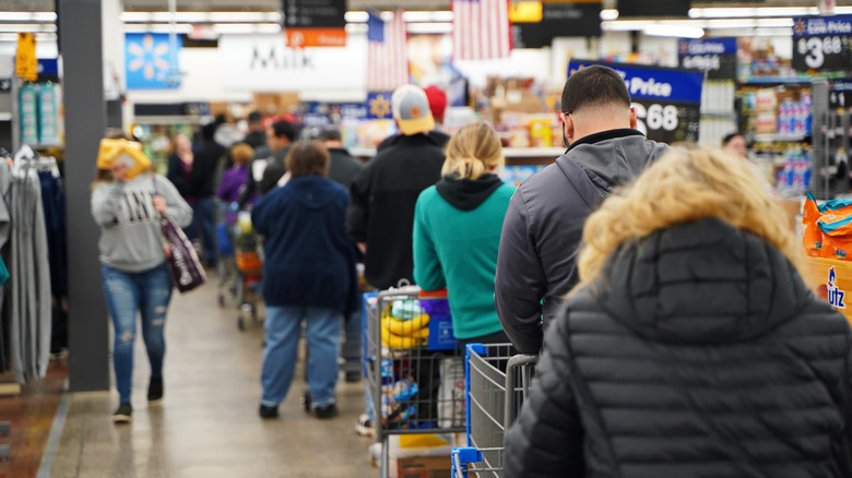 Line of shoppers in Walmart