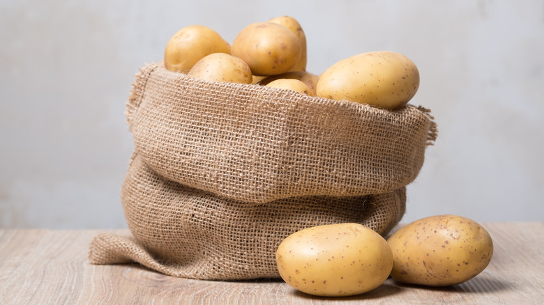 The Real Reason You Always See Bags Of Potatoes Inside Five Guys