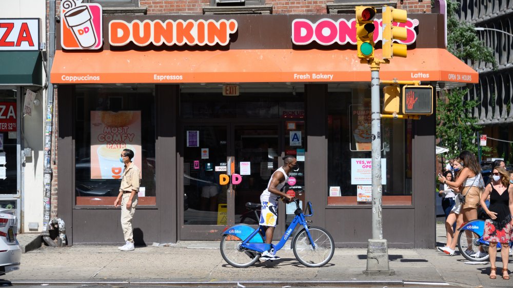 America slowly walks by Dunkin', which, admittedly isn't as catchy or motivational a slogan.