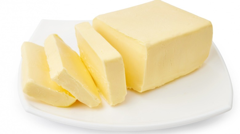 Sliced butter on a plate