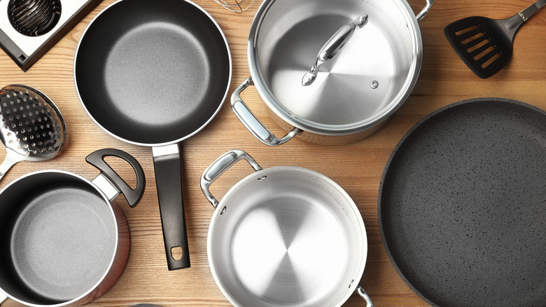 Pots and pans on a wood surface