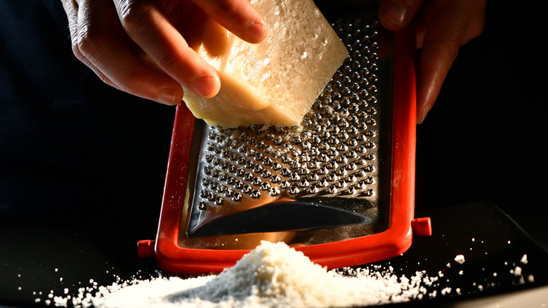 The Cooking Spray Hack To Keep Cheese Graters From Getting Sticky