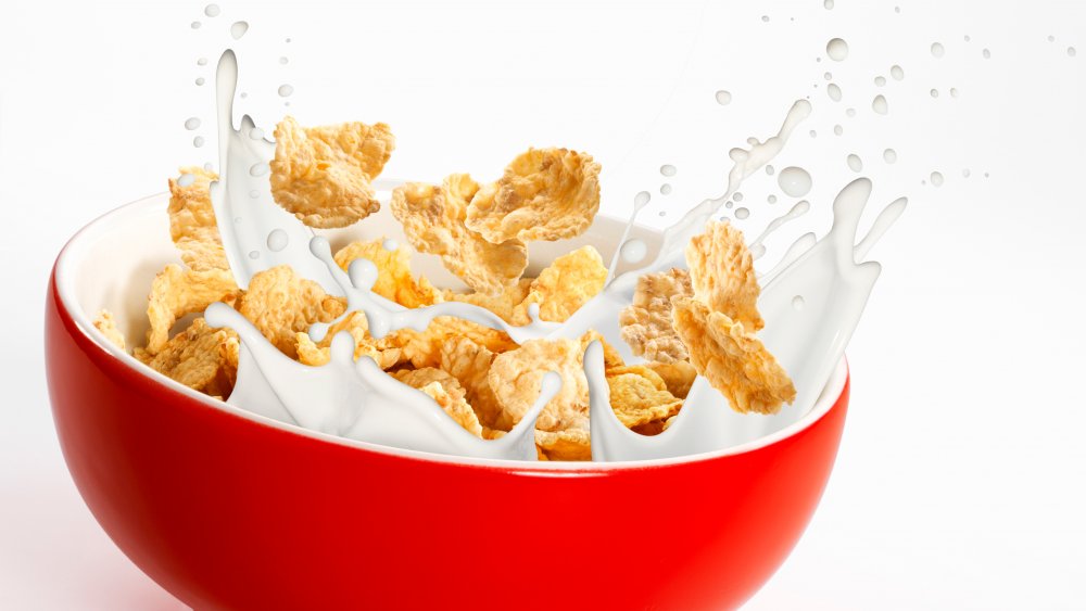 Cornflakes and milk in a bowl.