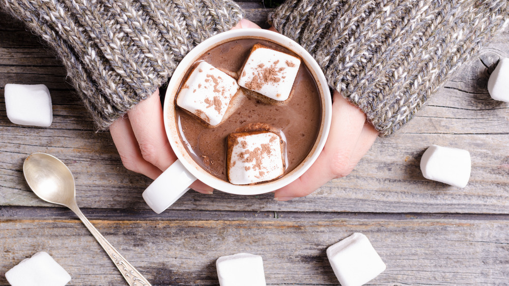 Woman holding hot chocolate