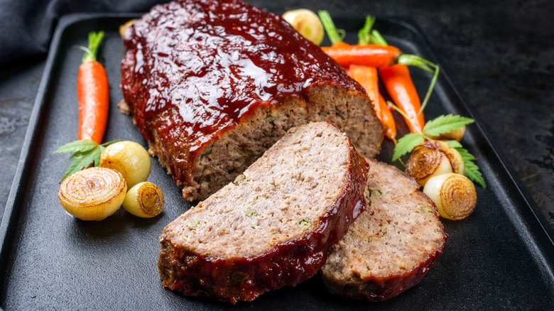 Meatloaf on a sheet pan with veggies