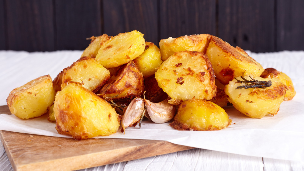 Board with roast potatoes