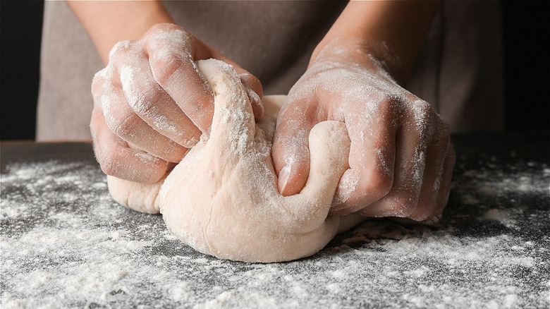 Kneading fresh bread