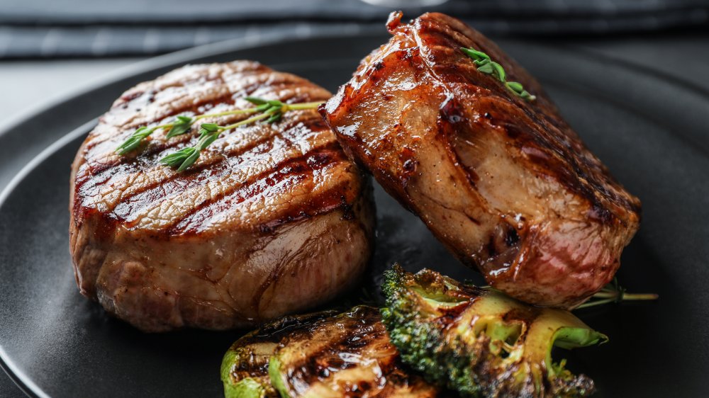 Grilled steak with thyme, brussels sprouts, and broccoli