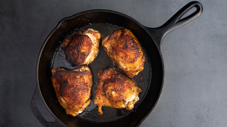 Chicken thighs in cast iron pan