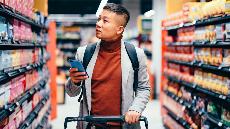 Person grocery shopping