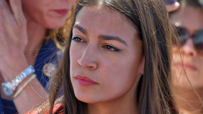 Alexandria Ocasio-Cortez staring sternly