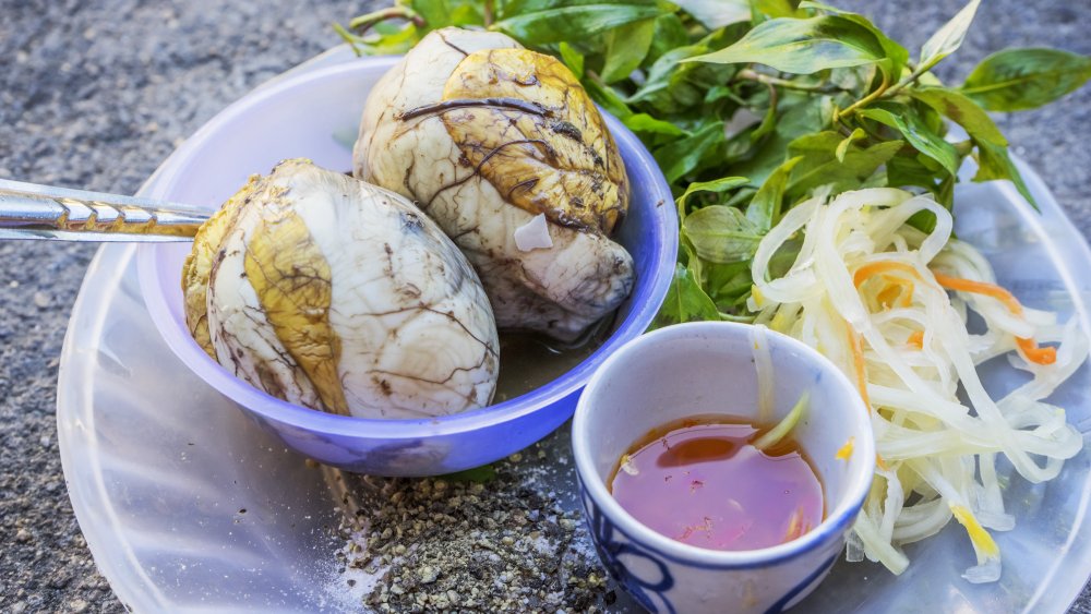 Balut served with vinegar