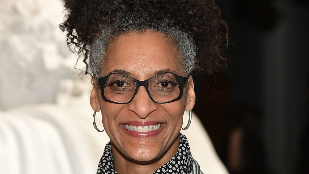 Carla hall sporting hoop earrings