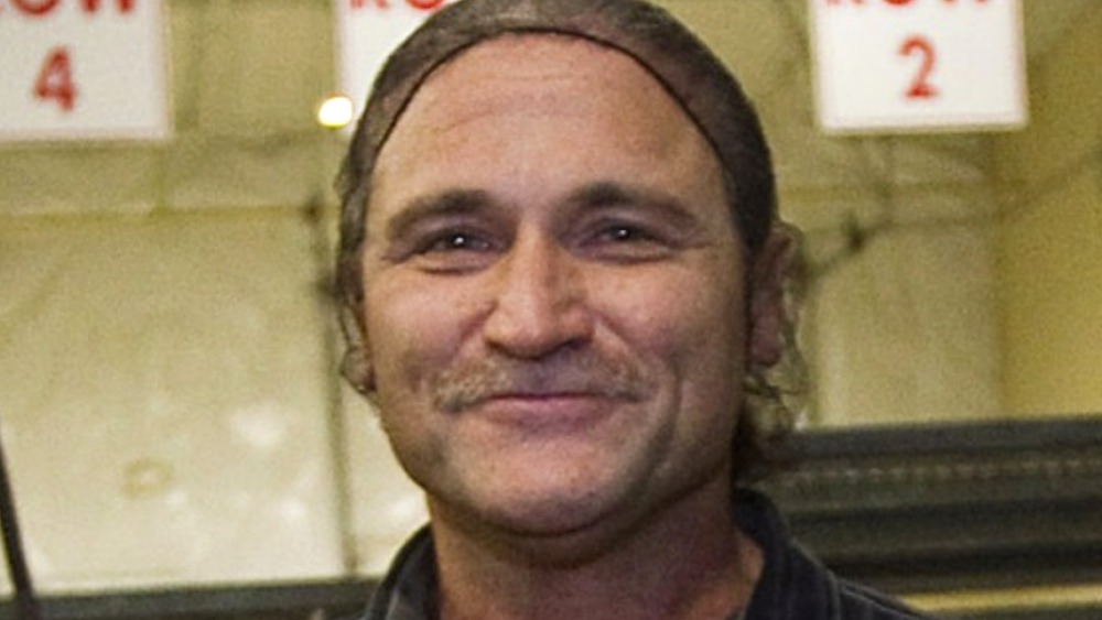 Dave Dahl displays loaves of his "killer" bread