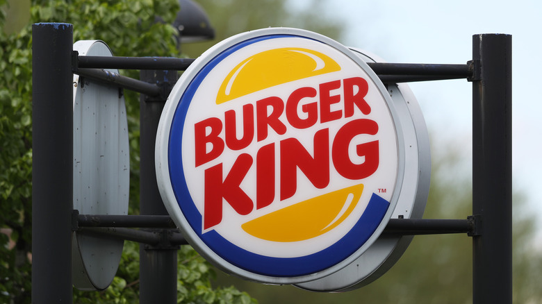 Burger King sign hanging outside