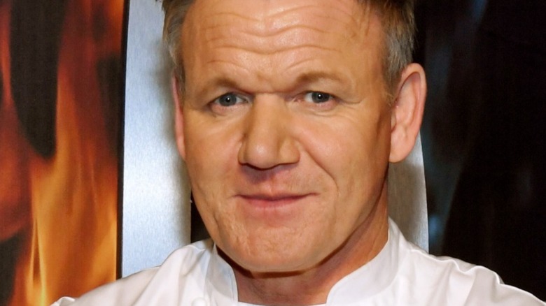 Gordon Ramsay wears a white chef uniform