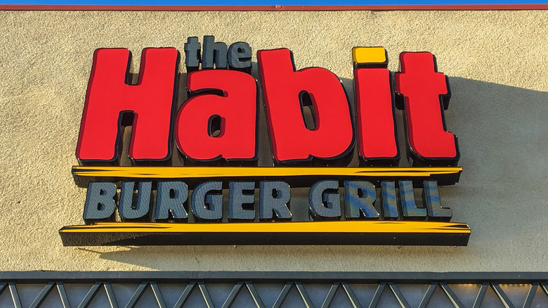 Habit Grill sign on building