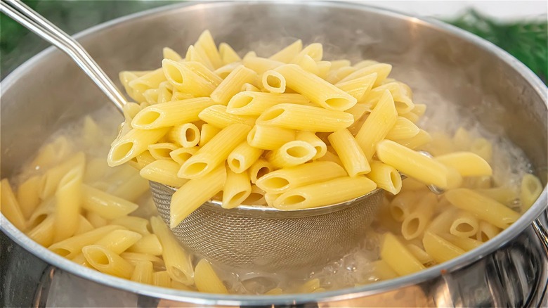 Cooked pasta in a strainer