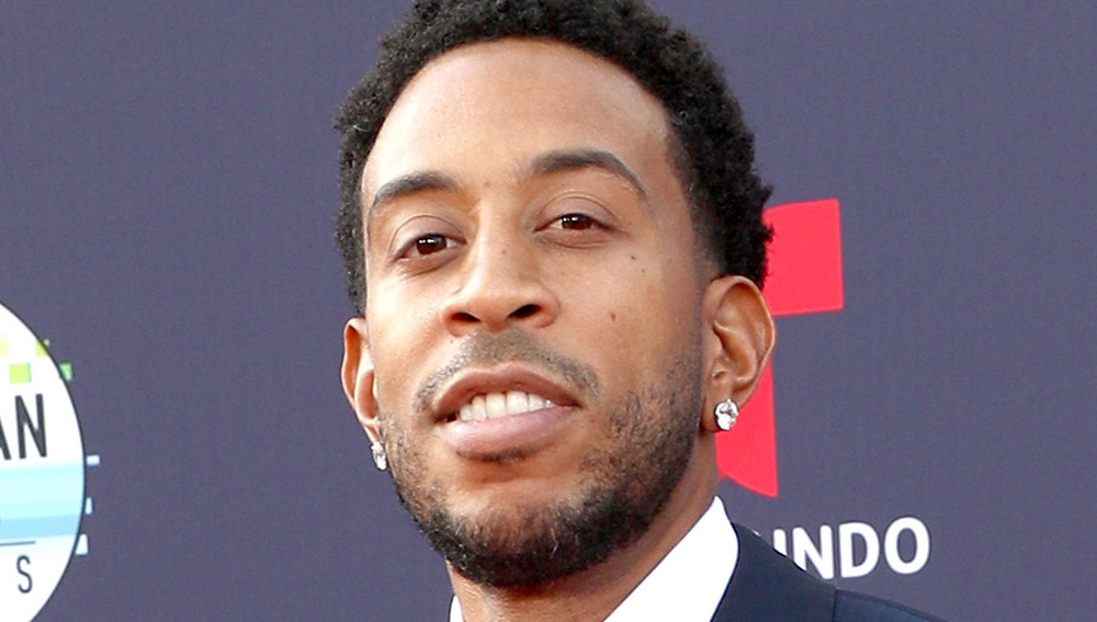 Ludacris smiling at an event