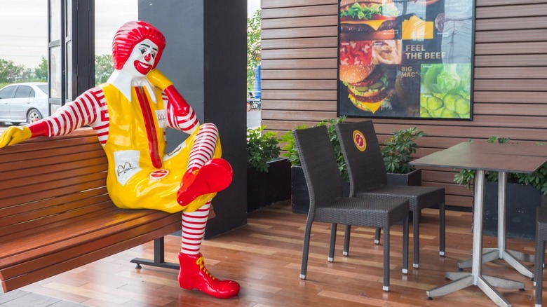 Inanimate Ronald McDonald thoughtfully sitting