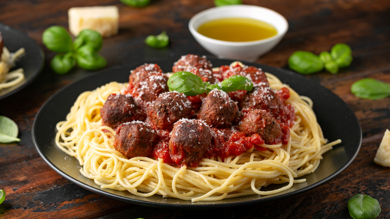 spaghetti and meatballs with basil