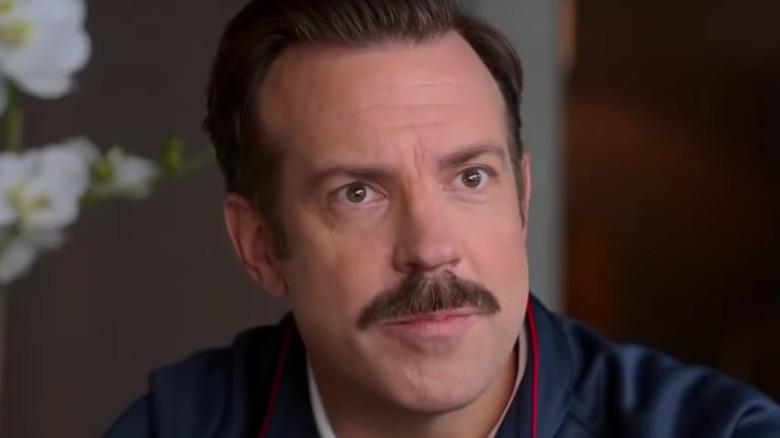 Jason Sudeikis as Ted Lasso pointing