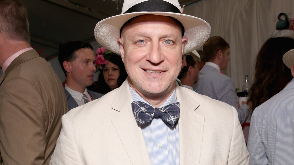 Chef Tom Colicchio in a white suit