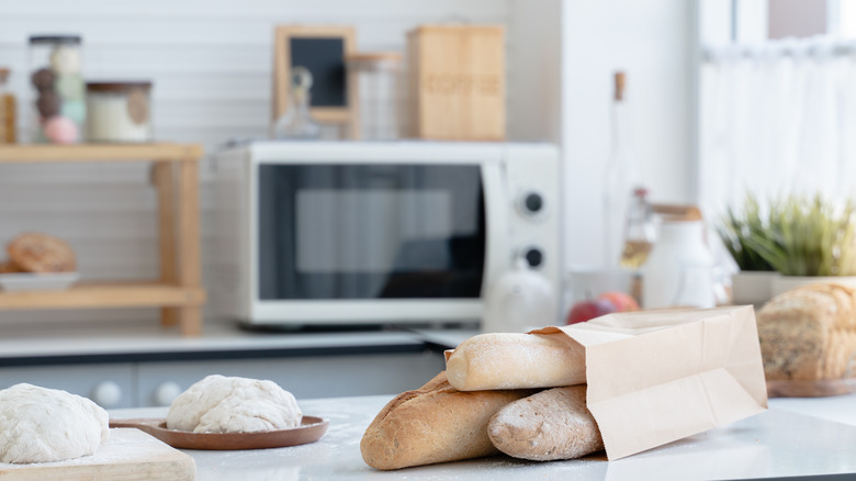 Loaves of bread on kitchen counter