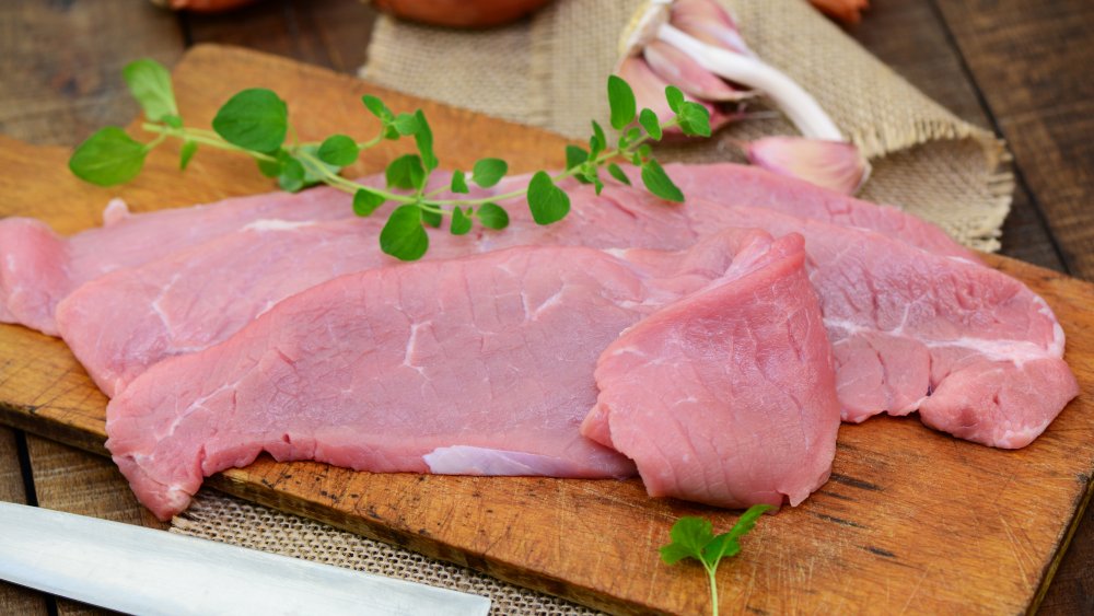 Veal on wooden board