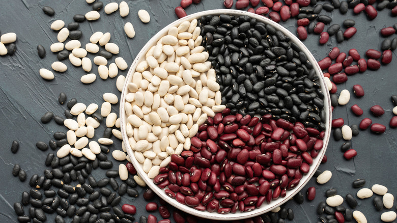 Colorful dried beans on plate