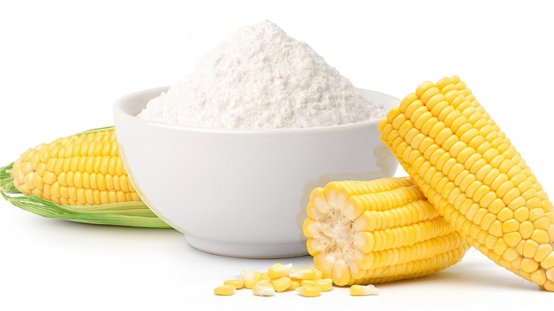 bowl of cornstarch with ears of corn