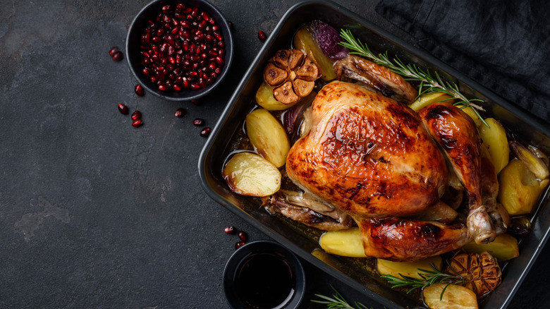 roasted chicken in a baking pan