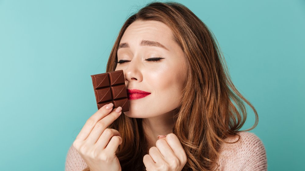 woman smelling chocolate